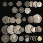 UN CLASSEUR contenant 39 monnaies françaises (Carolingiennes et Royales) en...