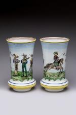 E. REGNAULT
Paire de vases cornets aux guerriers, 1868
en céramique émaillée,...