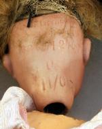MIGNONETTE poupée articulée. Tête en porcelaine marquée "germaine (?) 1246...