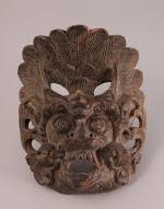 INDONÉSIE, BALI - XXeMASQUE en bois sculpté figurant garuda.Haut. 18,...