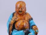 CHINE - Époque MING (1368-1644), XVIIeMAGOT en céramique vernissée. Signé.Haut....
