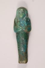 ÉGYPTE -OUCHEBTI en faïence verte, décor et inscription noire.Haut. 12...