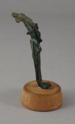 ÉGYPTE - Basse Époque
OSIRIS. Bronze à patine verte

Haut. 6 cm.