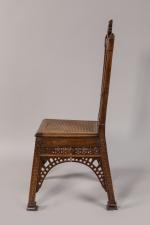 Chaise tour Eiffel en noyer, ajourée et datée 1889