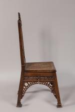 Chaise tour Eiffel en noyer, ajourée et datée 1889