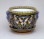 GIEN. CACHE-POT en céramique émaillée à décor de la Renaissance...