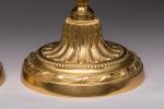 PAIRE de FLAMBEAUX LOUIS XVI
 
en bronze ciselé et doré....