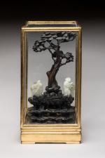 CHINE - XIXe siècle
Rocher en bois 

sur lequel sont posés...