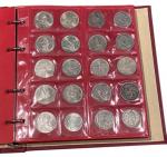 Un CLASSEUR Numis rouge contenant 90 monnaies (77 en argent...