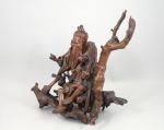 CHINE - XXe s. 
STATUETTE en bois sculpté figurant un...
